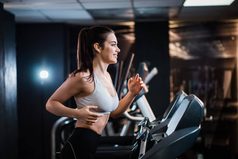 woman on gym treadmill