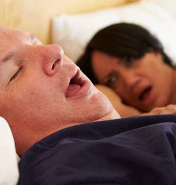 stock image shows sleeping with snoring image