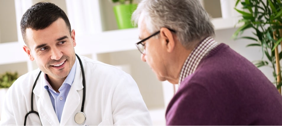 stock image shows doctor talking to patient image