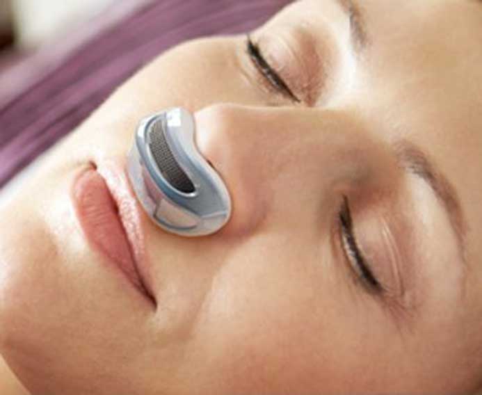 stock image shows cpap device with sleeping women image