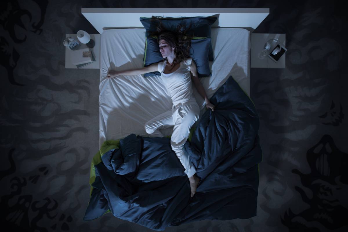Woman in bed who got when when she fell asleep